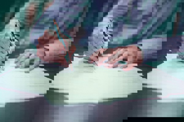 Man Writing Contract